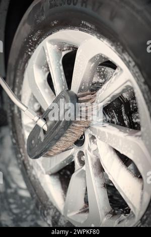 Details of cleaning car parts in self service car wash box Stock Photo