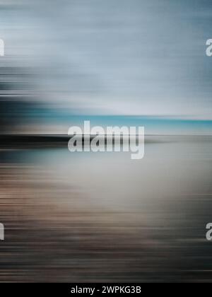 Calming blurred abstract image of lake shoreline landscape. Stock Photo