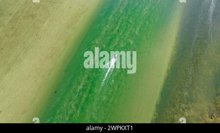 Boat in the turquoise waters of the Klein River Lagoon, Hermanus, Western Cape Province, South Africa, Africa Stock Photo