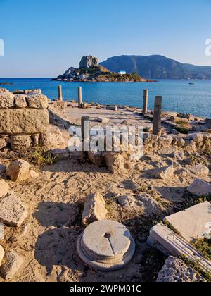 St. Stefanos Basilica Ruins and Kastri Island, Agios Stefanos Beach, Kos Island, Dodecanese, Greek Islands, Greece, Europe Stock Photo