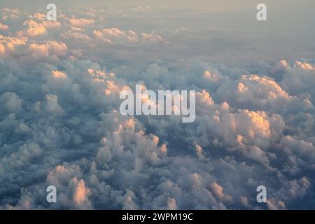 Fluffy clouds texture in evening sunset sunrise sky background and wonderful with nature fresh air Stock Photo