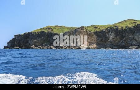 Batan, Philippines. Mar 8, 2024: Batanes cliffs provide natural defense in the country's northernmost islands, the nearest being 142 km away from southernmost point of Taiwan. PH Navy boost troops presence in strategically located islands with 119 new reservists + 76 recruits in training, an unpleasant deployment for Beijing accusing Manila of playing with fire. In 2023, Pres Marcos authorized American access to 4 other Philippine military bases (EDCA), 3 of them face Taiwan. PH & US militaries will conduct 2024 Balikatan naval exercise in Batanes & Palawan.Credit: Kevin Izorce/Alamy Live News Stock Photo