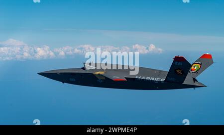 Valparaiso, United States. 23 February, 2024. A U.S. Marine Corps XQ-58A Valkyrie, highly autonomous, tactical stealth unmanned air vehicle, soars overhead during its second test flight at Eglin Air Force Base, February 23, 2023 in Valparaiso, Florida. The XQ-58A Valkyrie is designed to escort manned fighter aircraft during combat missions. Credit: MSgt. John McRell/U.S Marines/Alamy Live News Stock Photo
