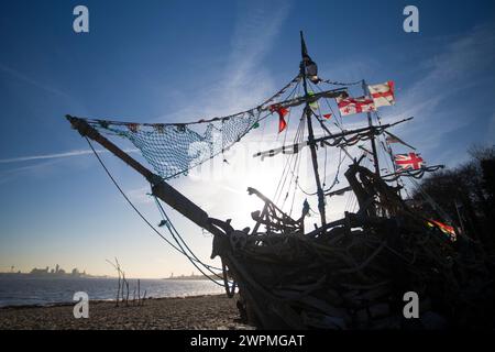28/11/16  As the cold front sweeps in with blue skies and freezing temperatures,  the Black Pearl pirate ship, made completely out of driftwood is sil Stock Photo