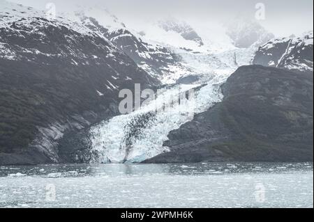 Tidewater Glacier reflected in the calm waters of College Fjord, Alaska, USA Stock Photo