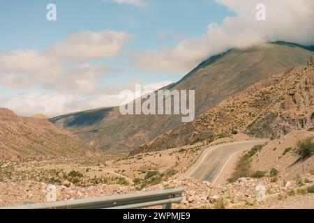 Road leading towards the Salinas Grandes salt flats near Purmamarca. High quality photo Stock Photo