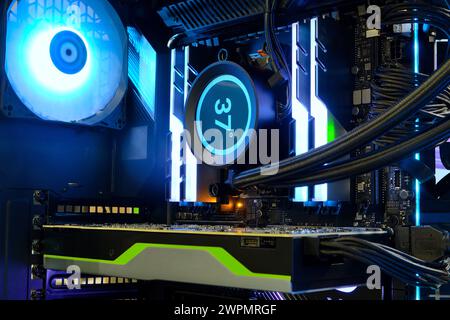 Close-up and inside high performance Desktop and cooling system on CPU socket with multicolored LED RGB light show status on working Stock Photo