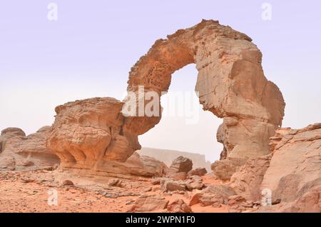 Arch Rock formation aka Arch of Africa or Arch of Algeria at Tamezguida in Tassili  national park, Algeria Stock Photo