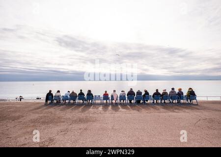 People on the beach promenade of Nice, Nice in winter, South of France, Cote d'Azur, France, Europe Stock Photo