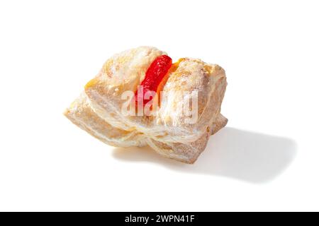 A delightful treat featuring flaky puff pastry filled with vibrant red Turkish Delight, dusted with a veil of powdered sugar Stock Photo