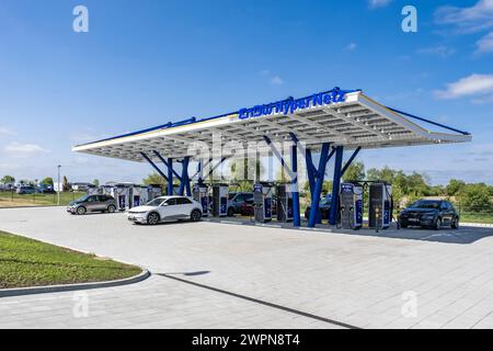 Modern EnBW fast-charging park for electric vehicles on the A7, Dätgen, Schleswig-Holstein, Germany Stock Photo