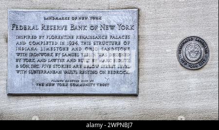 Exterior historical plaque, Federal Reserve Bank of New York, New York City, New York, USA Stock Photo