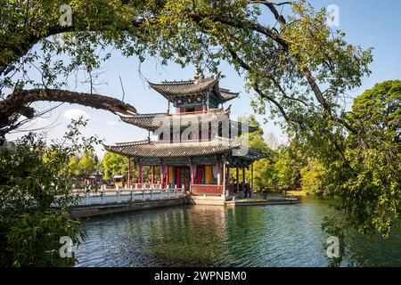 Temple on the Suocui Bridge at the Black Dragon Pool in Lijiang, Yunnan, China on 14 April 2011 Stock Photo