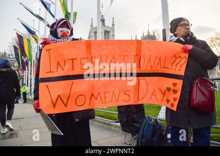 London, UK. 8th March 2024. Protesters gather in Parliament Square in