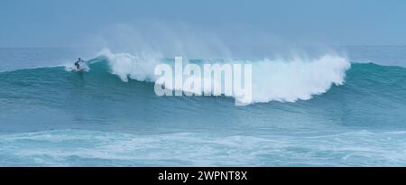 'Giant Cow' surf competition. Storm surge with big waves. Santander Municipality. Cantabrian Sea. Cantabria. Spain. Europe Stock Photo