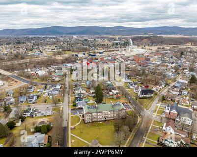 Waverly, NY, USA - 03-03-2024 - Cloudy winter aerial image of the downtown area in the Village of Waverly, NY. Stock Photo