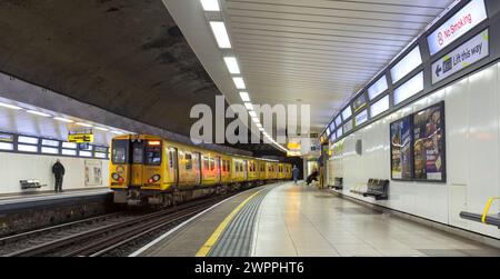 Merseyrail electrics class 507 third rail electric train 507023 at Hamilton Square underground station Birkenhead, UK Stock Photo