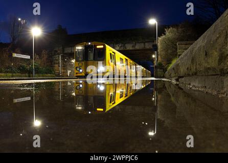 Merseyrail train in the station Stock Photo - Alamy