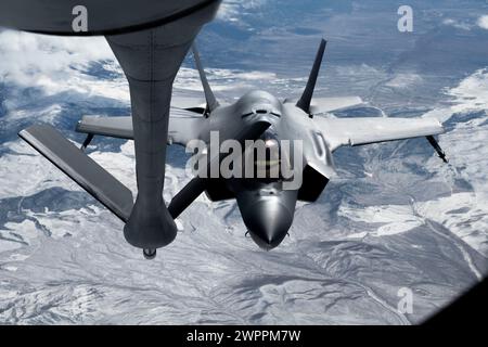 Rocky Mountains, United States. 27 February, 2024. A U.S Air Force F-35A Lightning II stealth fighter aircraft, assigned to the Black Widows of the 421st Fighter Squadron, approaches to refuel from an Air Force KC-135 Stratotanker during exercise EXPLODEO over the Rocky Mountains, February 27, 2024 in Utah.  Credit: A1C Gavin Hameed/U.S. Air Force/Alamy Live News Stock Photo