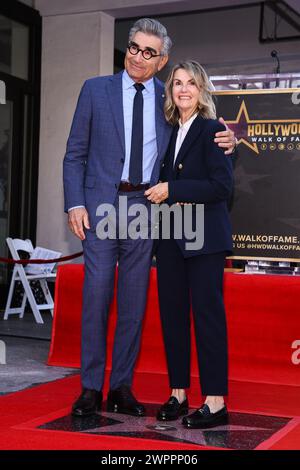 Hollywood, USA. 08th Mar, 2024. Deborah Divine (right) joins her husband Eugene Levy at his Star On The Hollywood Walk Of Fame Ceremony held in Hollywood, CA on March 8, 2024. (Photo By Sthanlee B. Mirador/Sipa USA) Credit: Sipa USA/Alamy Live News Stock Photo