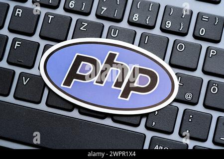 PHP programming language logo symbol on a modern desktop PC computer keyboard, website development, web apps and server side software, php programmers Stock Photo
