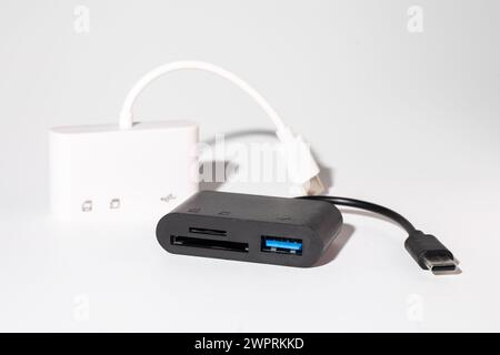 USB-C to USB 3.0 and SDMicroSD Card Reader Adapter. Connect devices to computer. Easily connect USB devices, SD cards, and microSD cards to laptop, ta Stock Photo