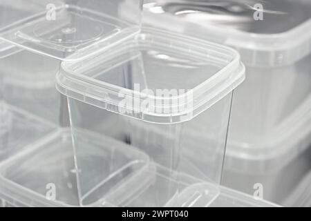 Big group of empty transparent plastic containers. Abstract retail background. Stock Photo