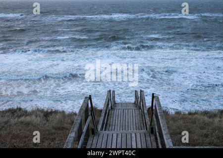 Wooden stairs to the beach of Sylt, Germany Stock Photo