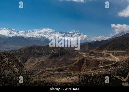 Barren mountain scenery before the Annapurna mountain range, Kingdom of Mustang, Nepal Stock Photo