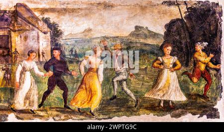 Rural dance, Termpera mural painting, c. 1540, Museo Civico d'Arte, Palzuo Ricchieri, historic centre with magnificent aristocratic palaces and Stock Photo