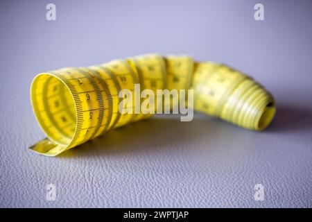 Yellow tape measure Stock Photo