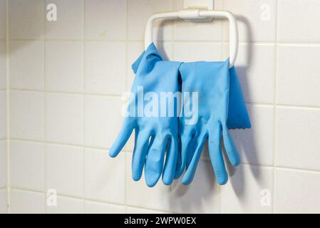 A pair of dirty rubber gloves for diswashing Stock Photo