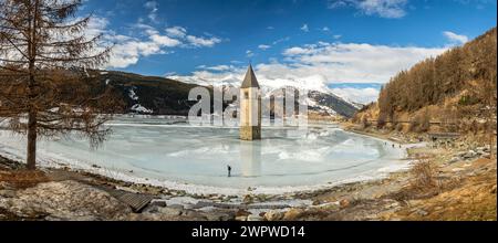 Panorama shot of flooded church tower in Lake Reschen (Reschensee) in South Tyrol, Italy Stock Photo