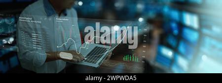 stock market analysts financial professional working with laptop computer research and analyze finacial ivestment on stock markets background. Stock Photo