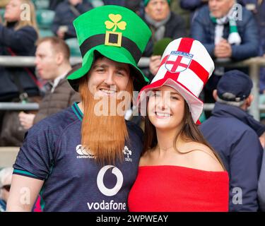 Twickenham, UK. 09th Mar, 2024. A couple supporting both England and Ireland before the 2024 Guinness 6 Nations match England vs Ireland at Twickenham Stadium, Twickenham, United Kingdom, 9th March 2024 (Photo by Steve Flynn/News Images) in Twickenham, United Kingdom on 3/9/2024. (Photo by Steve Flynn/News Images/Sipa USA) Credit: Sipa USA/Alamy Live News Stock Photo
