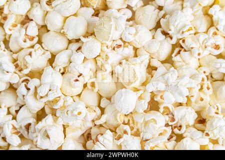 Fresh salted natural popcorn texture background. Close up detail Stock Photo