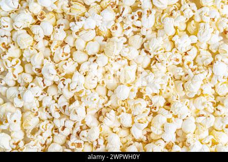 Fresh salted natural popcorn texture background. Close up detail Stock Photo