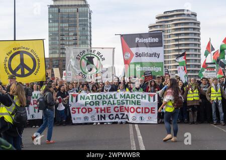 London, UK. 9 Mar 2024. Front of the march on Vauxhall Bridge. A huge peaceful march to the US Embassy demands a full ceasefire in Gaza and an end to Israeli genocide. The IDF has now killed over 30,000 people, mainly women and children, continue to ignore the ICJ ruling to avoid genocide and preparing a brutal assault on Rafah. Israel continues to stop the humanitarian aid and medical supplies needed to avoid mass deaths from disease and starvation and spread lies about UNRWA whose funding is essential. . Peter Marshall/Alamy Live News Stock Photo