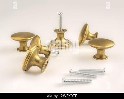 Brass joinery cabinet hardware knobs with stainless steel fixing bolts isolated on a white background Stock Photo