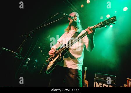 Solothurn, Switzerland. 08th Mar, 2024. The German indie rock band Sportfreunde Stiller performs a live concert at Kofmehl in Solothurn. Here singer and guitarist Peter Brugger is seen live on stage. (Photo Credit: Gonzales Photo/Alamy Live News Stock Photo