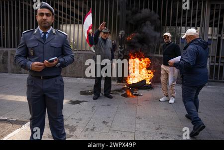 Beirut, Lebanon. 08th Mar, 2024. Lebanese citizens protest at banks in Hamra, Beirut, Lebanon on Mar. 8, 2024. Since the 2019 banking collapse, Lebanese depositors have been barred from withdrawing from their savings. This was an attempt by the banks to combat the liquidity crunch, but has harmed depositors. (Photo by Collin Mayfield/SIPA USA) Credit: Sipa USA/Alamy Live News Stock Photo