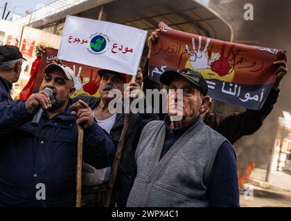 Beirut, Lebanon. 08th Mar, 2024. Lebanese citizens protest at banks in Hamra, Beirut, Lebanon on Mar. 8, 2024. Since the 2019 banking collapse, Lebanese depositors have been barred from withdrawing from their savings. This was an attempt by the banks to combat the liquidity crunch, but has harmed depositors. (Photo by Collin Mayfield/SIPA USA) Credit: Sipa USA/Alamy Live News Stock Photo