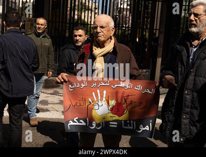 Beirut, Lebanon. 08th Mar, 2024. Lebanese citizens protest at banks in Hamra, Beirut, Lebanon on Mar. 8, 2024. Since the 2019 banking collapse, Lebanese depositors have been barred from withdrawing from their savings. This was an attempt by the banks to combat the liquidity crunch, but has harmed depositors. (Photo by Collin Mayfield/SIPA USA) Credit: Sipa USA/Alamy Live News Stock Photo