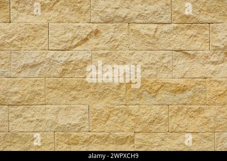 Beige stone blocks in the wall Stock Photo