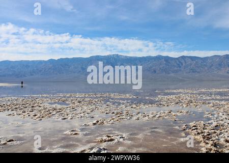 Tourists on Badwater Basin Salt Flats Stock Photo