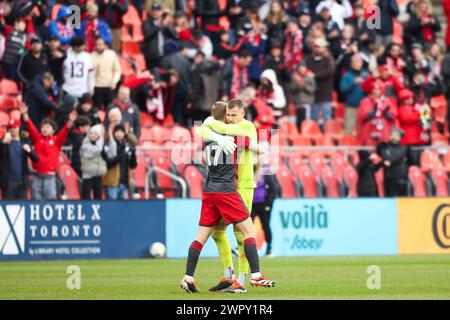 Toronto, Canada. 09th Mar, 2024. Toronto FC defender Sigurd Rosted (17) and goalkeeper Luka Gavran (90) celebrate after defeating Charlotte FC in a MLS soccer match in Toronto, on Saturday, March 9, 2024. (Photo by Michael Chisholm/Sipa USA) Credit: Sipa USA/Alamy Live News Stock Photo