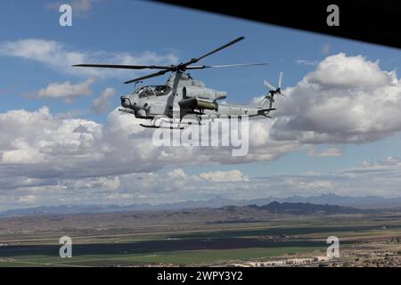 U.S. Marines with Marine Operational Test and Evaluation Squadron 1(VMX-1) conduct a training exercise with the AH-1Z Viper at Yuma, Arizona, March 7, 2024. VMX-1 is an operational test squadron that tests multiple aircraft, allowing for the continuation of safety improvements, aircraft reliability, and overall lethality of Marine Corps aircraft. (U.S. Marine Corps photo by Lance Cpl. Elizabeth Gallagher) Stock Photo