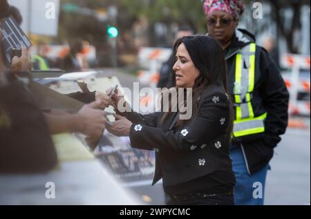 Actress and director PAMELA ADLON signs autographs outside the Paramount Theater in downtown Austin during the world premiere of the movie 'Babes' during the second day of the South by Southwest (SXSW) Festival in Austin, TX on March 9, 2024. Credit: Bob Daemmrich/Alamy Live News Stock Photo