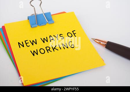 New ways of working text on yellow notepad. New normal concept. Stock Photo