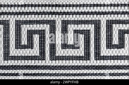 Abstract pattern of woven rug. Geometric pattern. Macro photography. Stock Photo